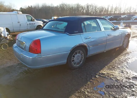 2010 Lincoln Town Car Signature Limited из США, поврежденный, VIN 2LNBL8CV1AX605844